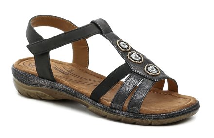 Damen-Sommer-Sandale auf einem leichten Keil mit Klettverschluss über dem Knöchel. Die Schuhe sind aus einer Kombination aus Textil und Synthetik hergestellt.
