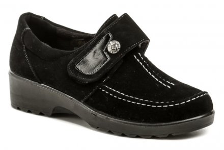 Damen-Wanderschuhe mit leichtem Keilabsatz und Klettverschluss. Aus Textilmaterial gefertigt und mit weichem Textilfell isoliert.